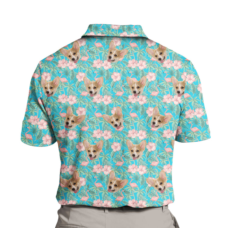 Flamingo Haven Custom Polo Shirt featuring a vibrant design with pink flamingos and tropical hibiscus flowers. The shirt showcases a colorful, exotic pattern that evokes a tropical paradise, with a mix of palm leaves and bright blossoms. Crafted from soft, breathable fabric, this polo combines style and comfort, perfect for adding a touch of tropical flair to any casual outfit.